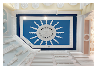 Decorative ceiling lily centre with husks and surrounding decorative panel moulding.